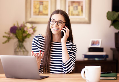 Employee working from home connected through the cloud.